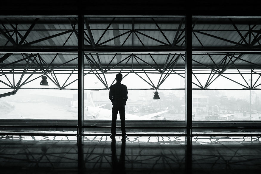 man waiting for a plane