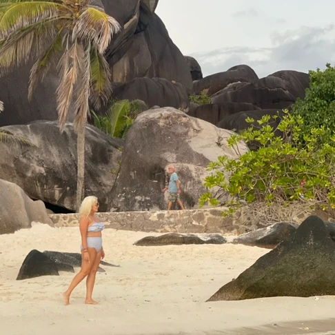 Walking on Source d'Argent beach in the Seychelles