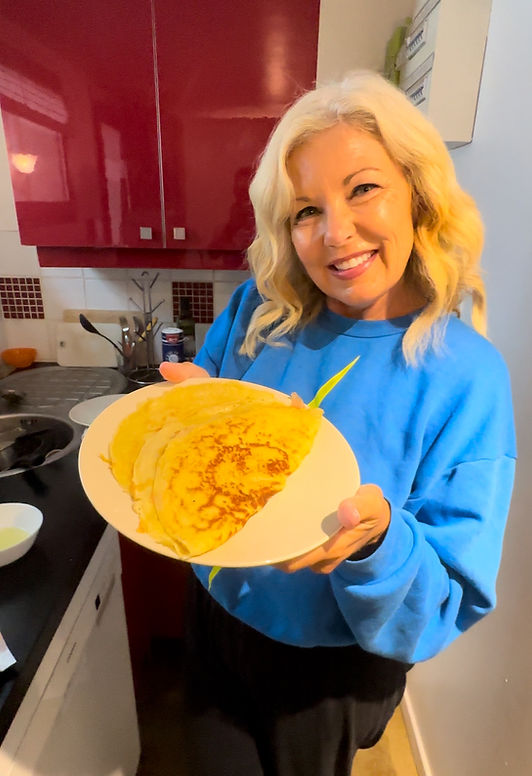 woman making crepes