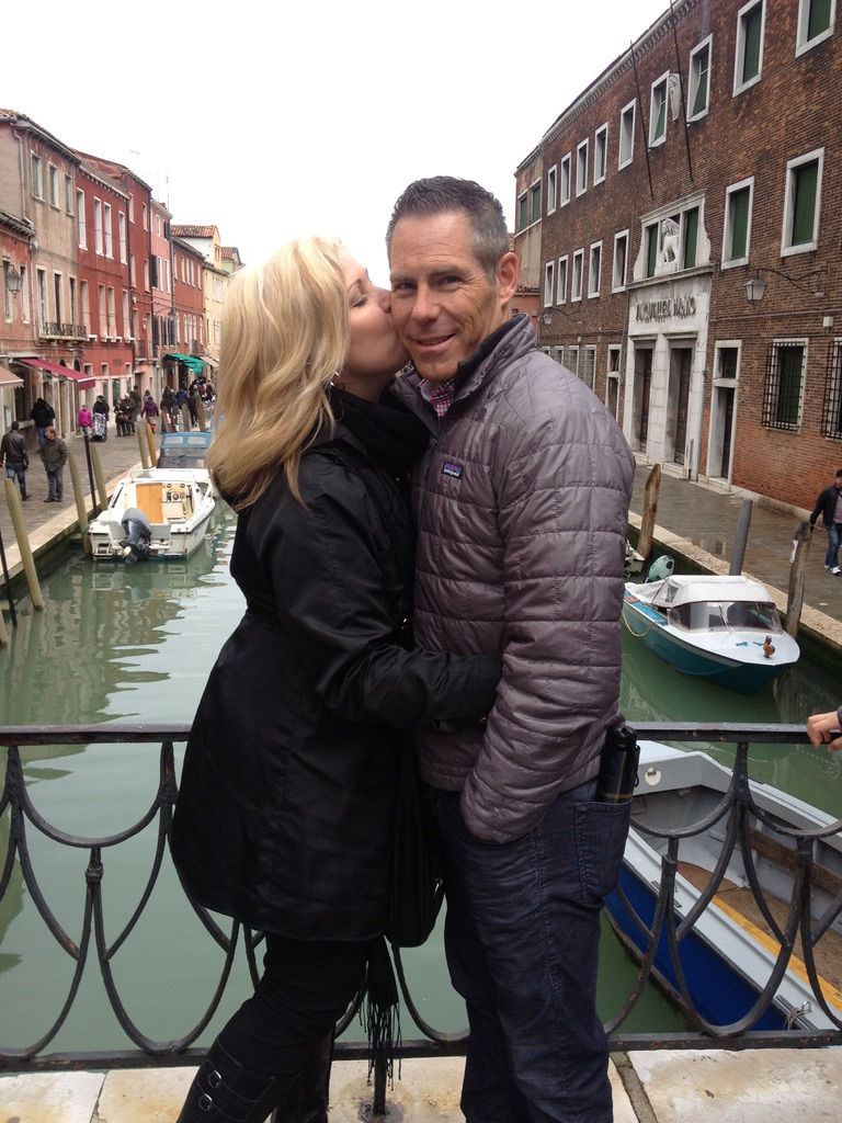 A couple on a bridge in  Murano