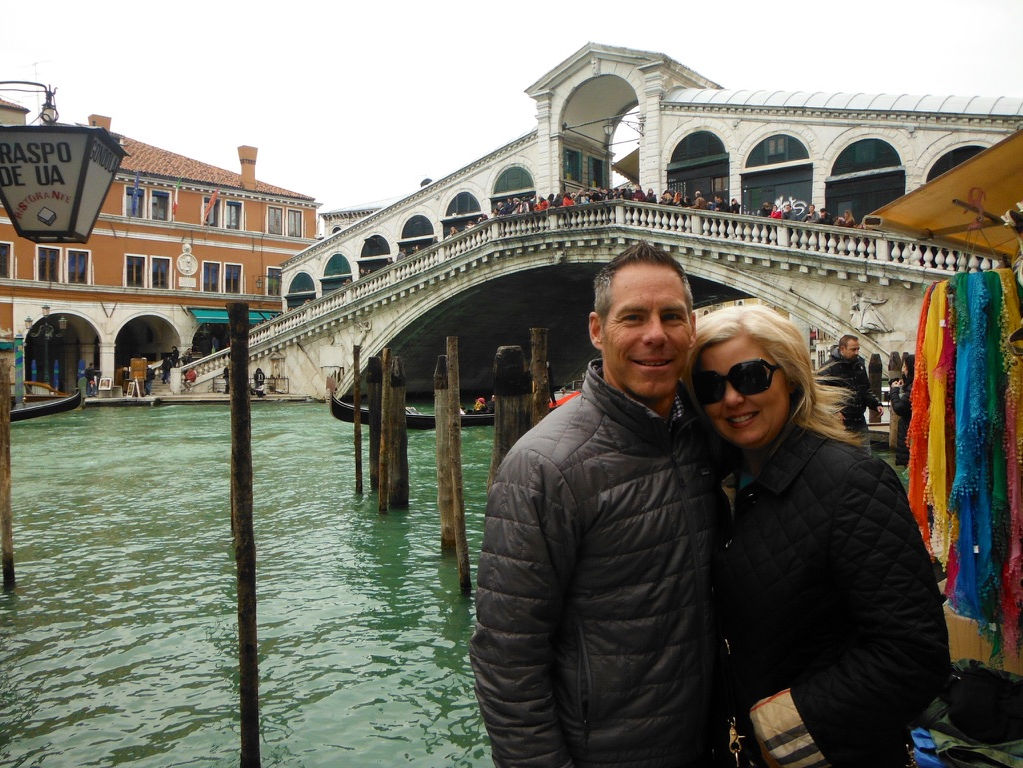 A couple at the  Rialto Bridge