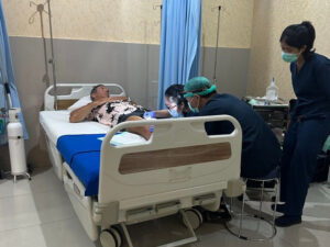 Shayne getting his leg checked in Bali